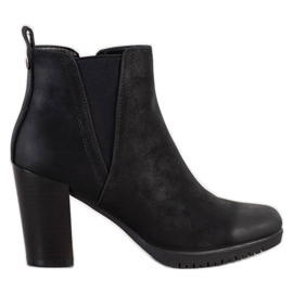 Bottes sur un bar Sergio Leone le noir