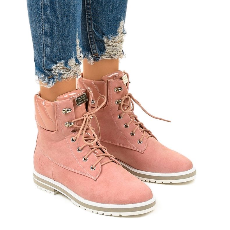 Bottes isolées roses d'Arlinda Bottes isolées roses d'Arlinda