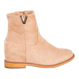 Sergio Todzi Bottines compensées élégantes beige Sergio Todzi Bottines compensées élégantes beige