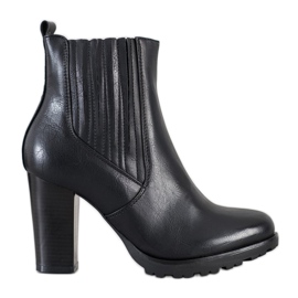 Super Mode Bottines noires sur un poteau le noir