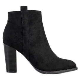 Seastar Bottines en daim sur un bar le noir