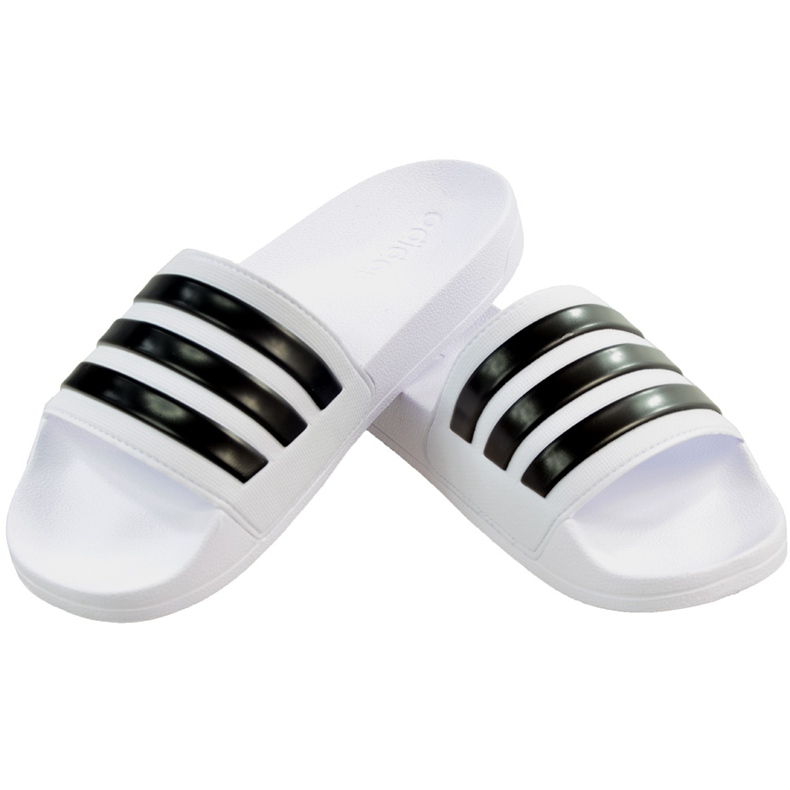 Pantoufles Adidas Adilette Shower blanches AQ1702 le noir Pantoufles Adidas Adilette Shower blanches AQ1702 le noir