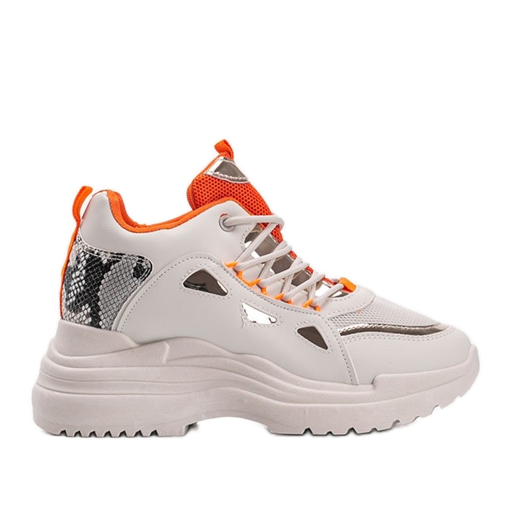 Les baskets serpent blanches et beiges de Felicia