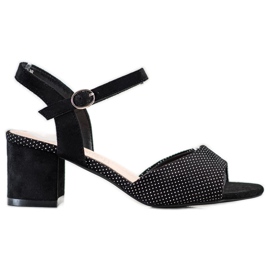 Sandales noires sur une barre Sergio Leone