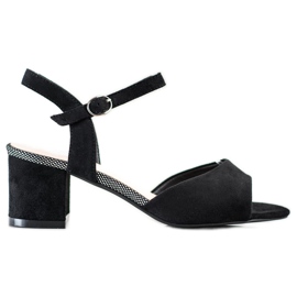 Sandales noires sur une barre Sergio Leone