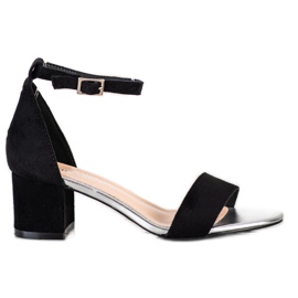 Sandales sur un bar Sergio Leone noir