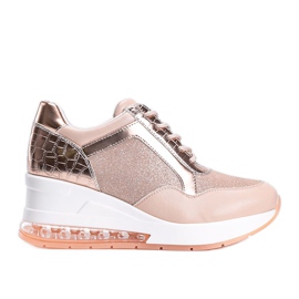 Baskets en or rose sur le compensé Jimena