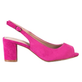 Goodin Sandales en daim sur un bar rose