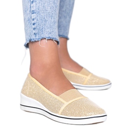 Ballerines dorées scintillantes sur le coin Glam Star d'or