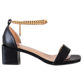 Seastar Sandales avec une chaîne décorative le noir d'or