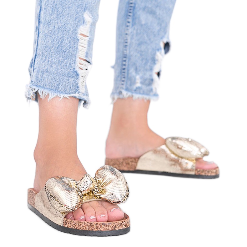 Chaussons dorés avec nœud Norris d'or Chaussons dorés avec nœud Norris d'or