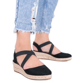 Espadrilles noires sur le compensé Monic