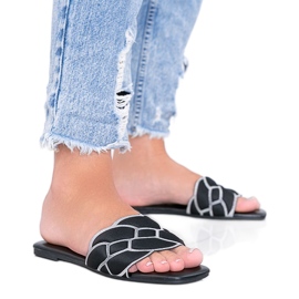 Chaussons noirs avec tige décorative Stormi