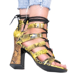 Sandales jaunes au motif peau de serpent Merry noir