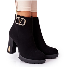 PS1 Bottes chaudes noires sur une barre merveilleuse doré