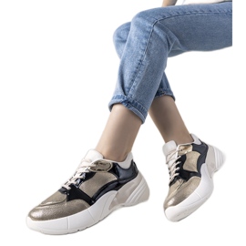 Baskets dorées à semelle haute Rude noir