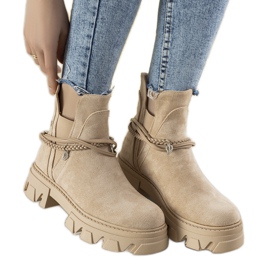 Bottes beiges avec un bracelet Fearless