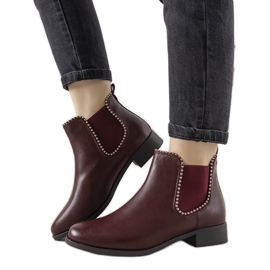 Bottines rouges classiques avec une bande élastique et des clous mérinos