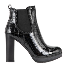 Bottines noires classiques sur le poteau Moment le noir