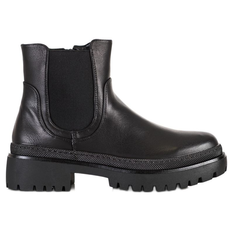 Renda Bottes noires sur la plate-forme le noir