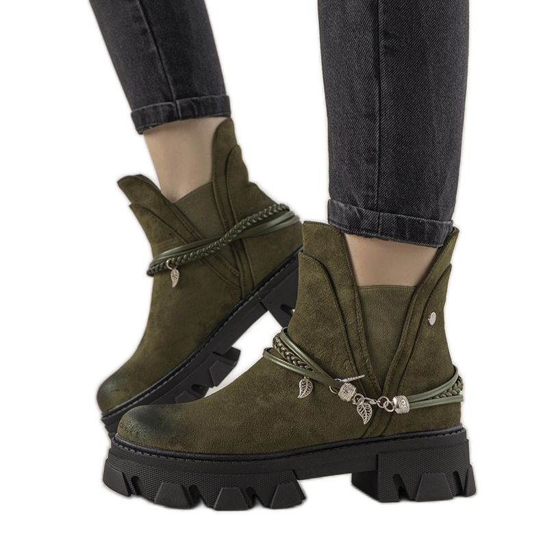 Bottes vertes avec un bracelet Fearless