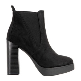 Bottes noires pour femmes sur un haut poteau Lacasse