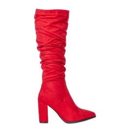 Bottes rouges sur un haut poteau Swing Bottes rouges sur un haut poteau Swing