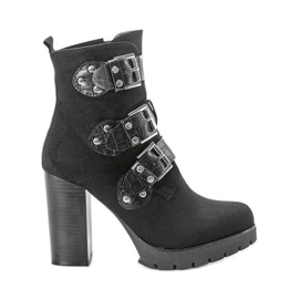 Bottes noires sur le poteau Corgi le noir
