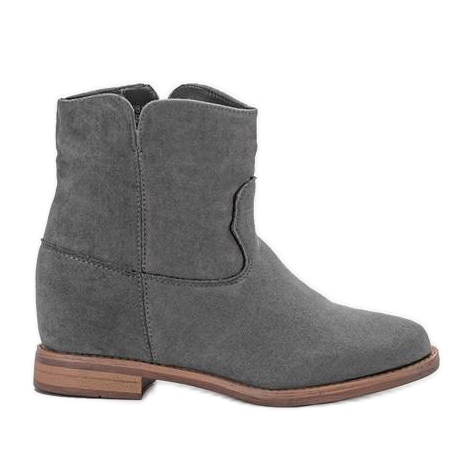 Bottes grises sur un coin intérieur Veni