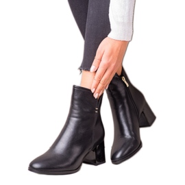 Goodin Bottines noires sur un poteau le noir
