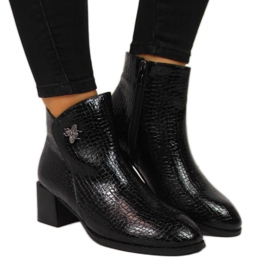 Bottes noires avec une mouche en peau de serpent Filippo W PAW287