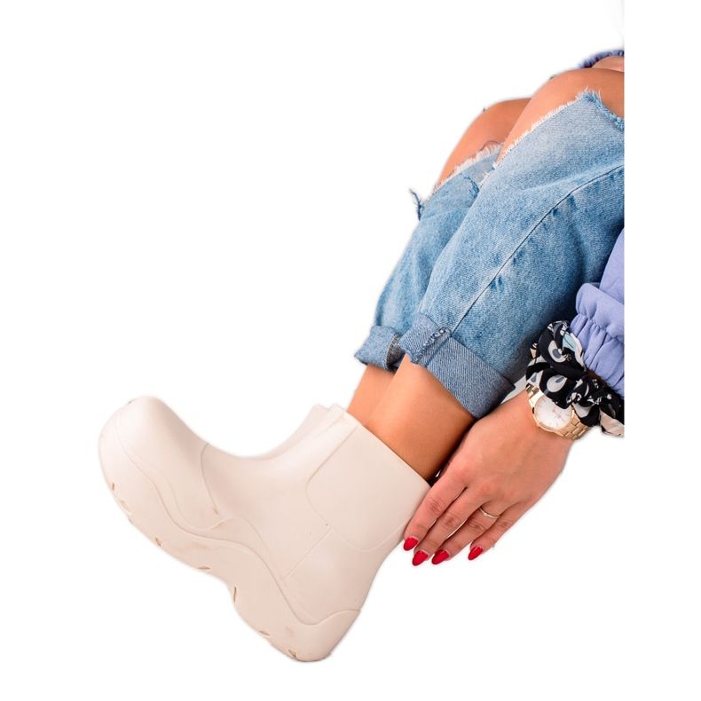 TRENDI Wellies sur la plateforme de mode blanche TRENDI Wellies sur la plateforme de mode blanche