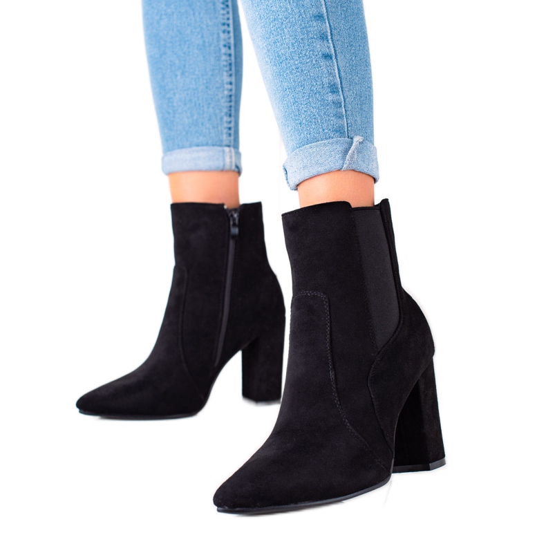 Marquiz Bottes élégantes noires sur un poteau le noir