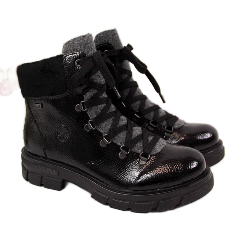 Bottes laquées isolées noires W Rieker Z9132 le noir bleu