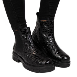 Bottes isolées en cuir Rieker W Z9152-00 noir blanc
