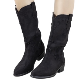 Bottes noires sur le poste LuckyShoes le noir