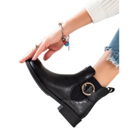 TRENDI Bottes avec une boucle d'or le noir