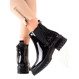 Bestelle Boots laquées noires le noir