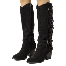 Bottes de cowboy isolées en cristal noir
