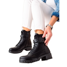 Bestelle Bottes trappeurs en cuir écologique noir
