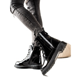 Filippo Bottes en cuir verni noir