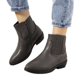 Bottes de cowboy isolées Jolicoeur grises Bottes de cowboy isolées Jolicoeur grises