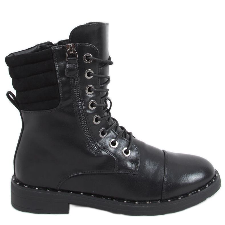 Bottes noires solitaires le noir