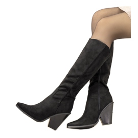 Bottes cavalières noires sur le poteau Natascia le noir