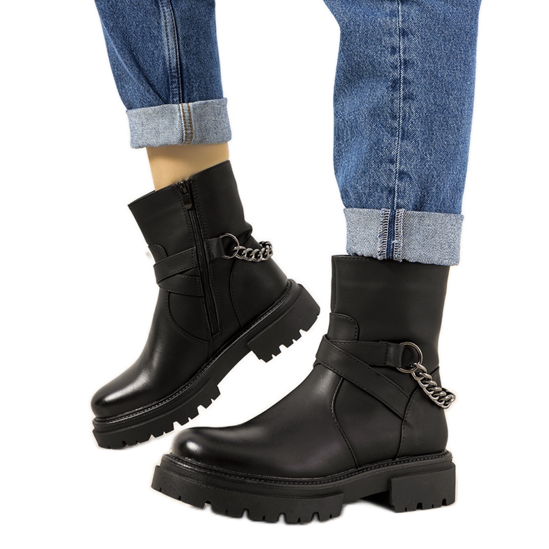 Bottes isolées noires avec chaîne Porta le noir