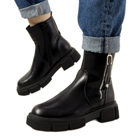 Bottes isolées noires de Barga