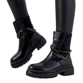 Bottes isolées noires avec chaînes Mora le noir