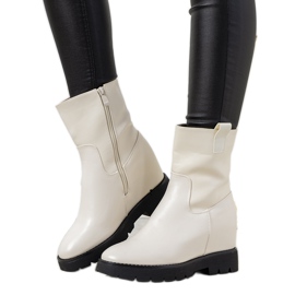 Bottines blanches pour femmes sur le talon compensé New Goldies