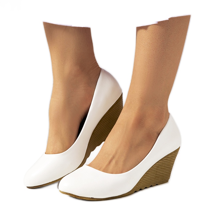Escarpins blancs sur le coin Unies blanche écru