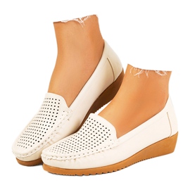 Mocassins beiges sur le talon compensé Dalal